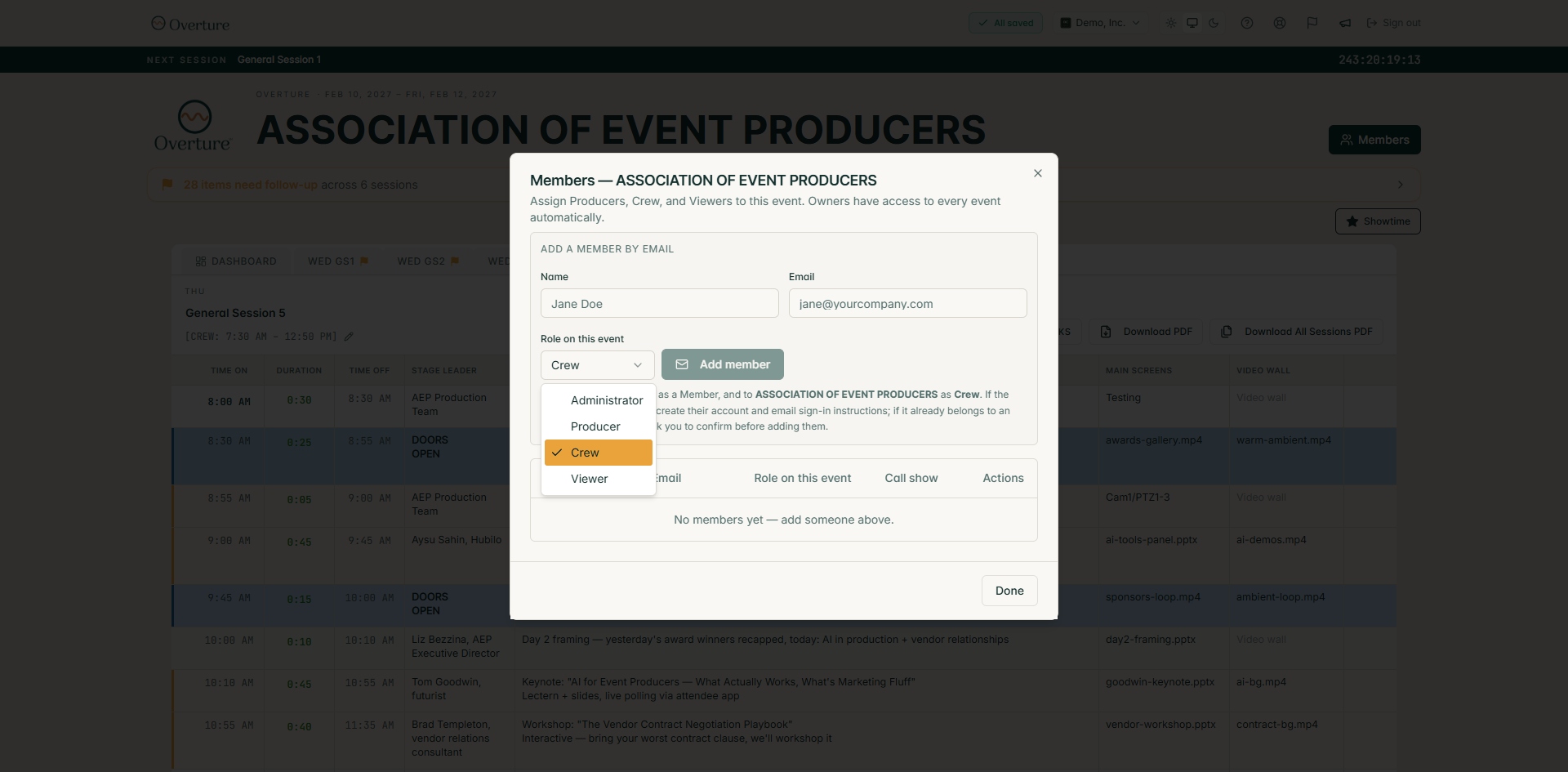 The Members dialog open inside an event with an empty members list. The Add a member by email form shows Name and Email fields filled in, and the Role on this event dropdown is open showing all four roles: Administrator, Producer, Crew (checked), and Viewer.